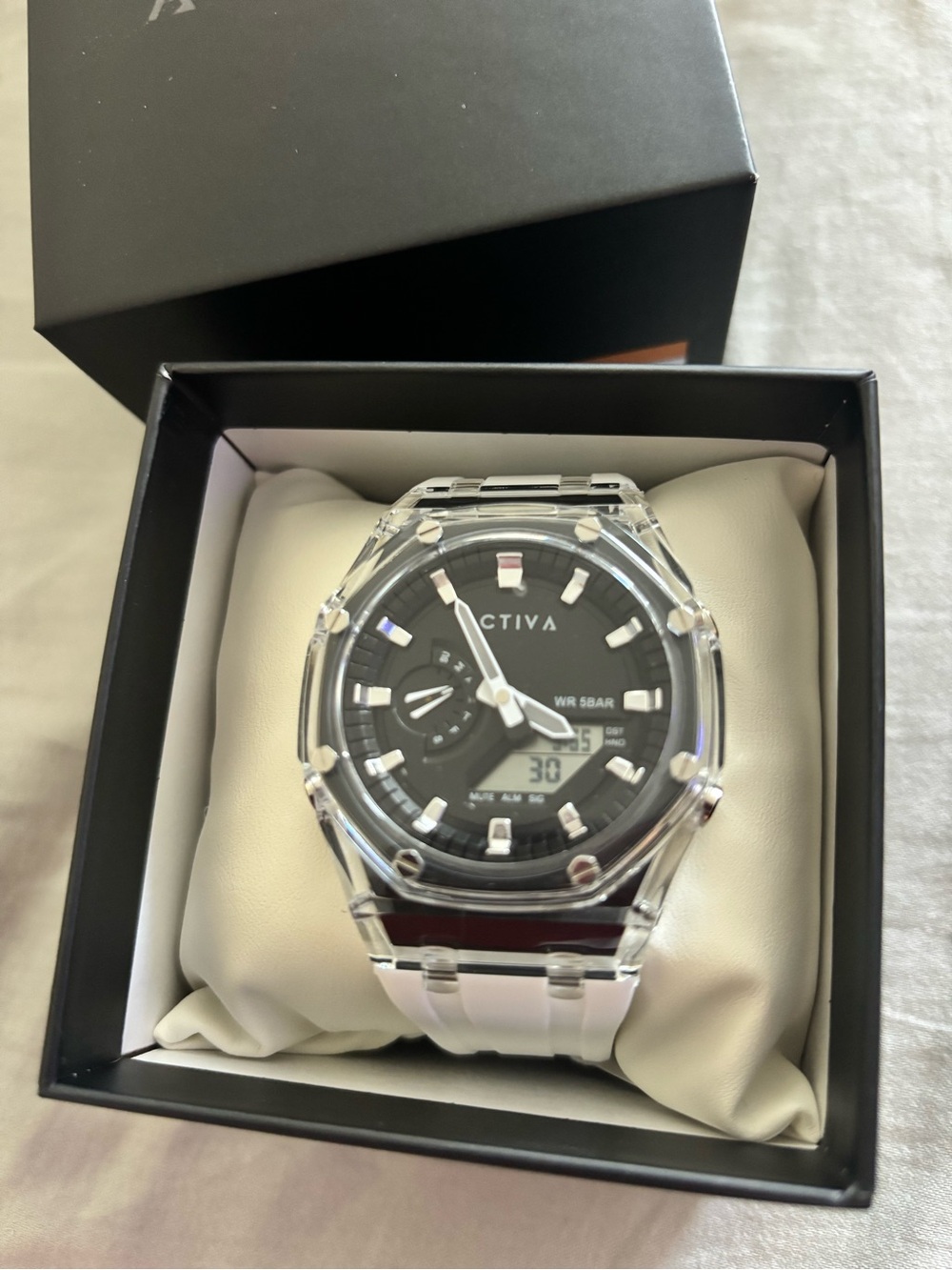 ACTIVA Men's Black Dial Sport Watch with Clear Case and White Band